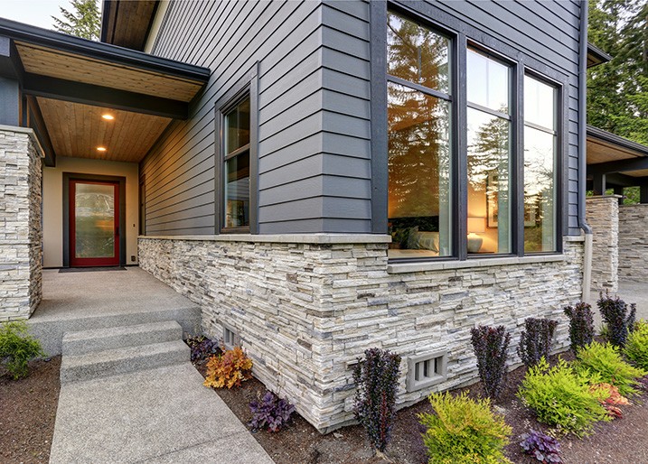 Grey vinyl siding on residential home in Green Bay